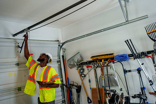 Professional Garage Door Installation technician working in Oskaloosa, KS